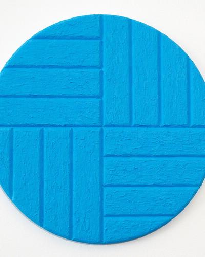 On an oval canvas is light blue color